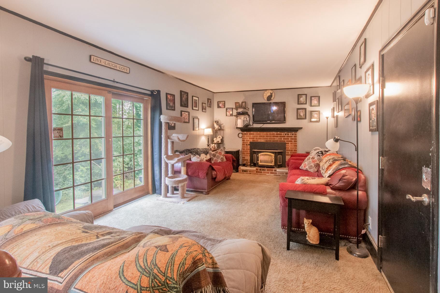521 Milford Road Downingtown, PA 19335 - Photo 17 of 28 Family room with brick fireplace