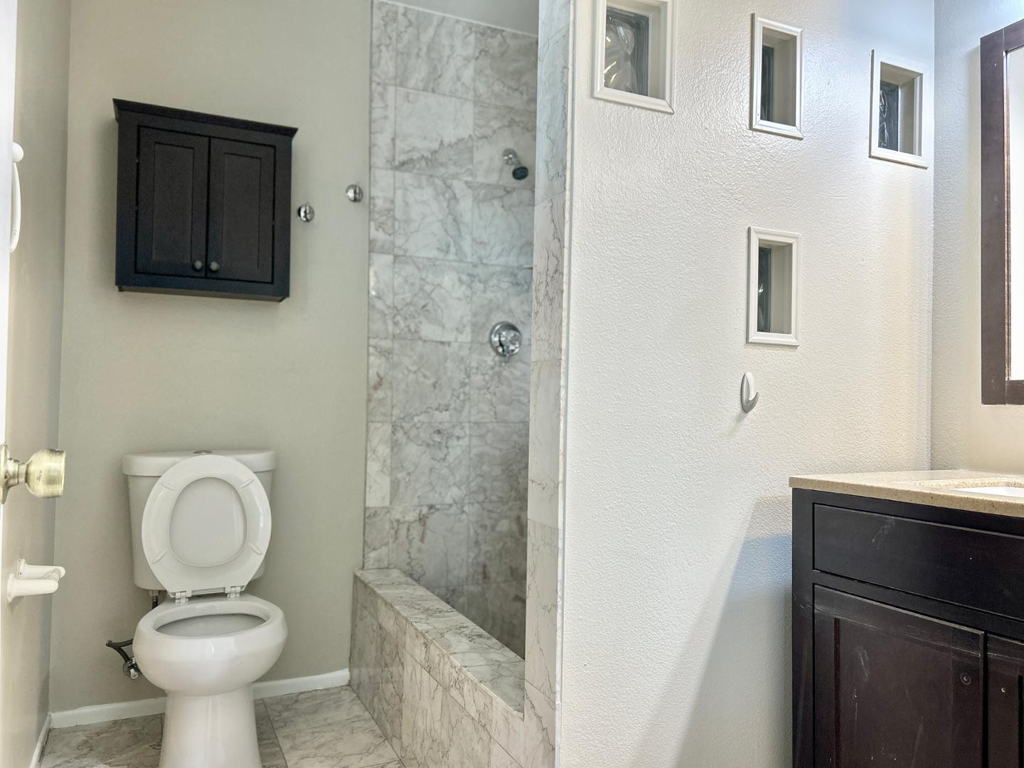 6143 West Del Rio Street Chandler, AZ 85226 - Photo 10 of 19 a bathroom with a sink toilet and shower