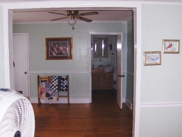 1235 Girl Scout Road Lizella, GA 31052 - Photo 16 of 29 a view of livingroom with furniture and wooden floor
