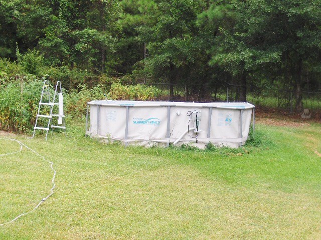 1235 Girl Scout Road Lizella, GA 31052 - Photo 27 of 29 a view of a backyard