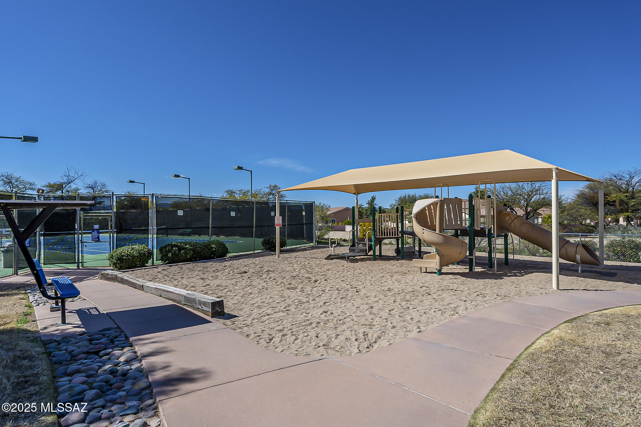 3592 West Sky Ridge Loop Tucson, AZ 85742 - Photo 37 of 41 a view of a outdoor space with porch and sitting area