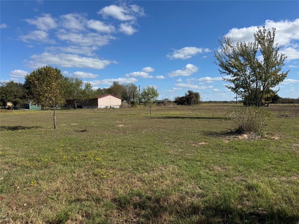114 Speir Lane, Unit B Elgin, TX 78621 - Photo 2 of 11 a view of an outdoor space and yard