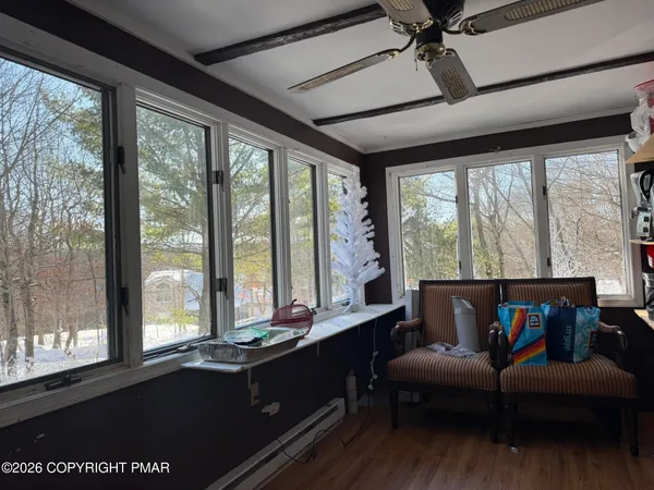 a living room with furniture and a window