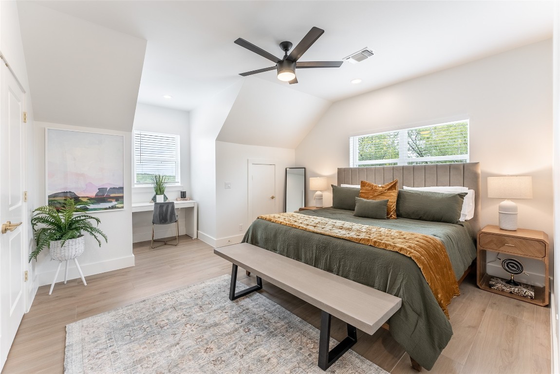 12605 Fitzhugh Road Austin, TX 78736 - Photo 20 of 40 a bed room with a bed and a couch