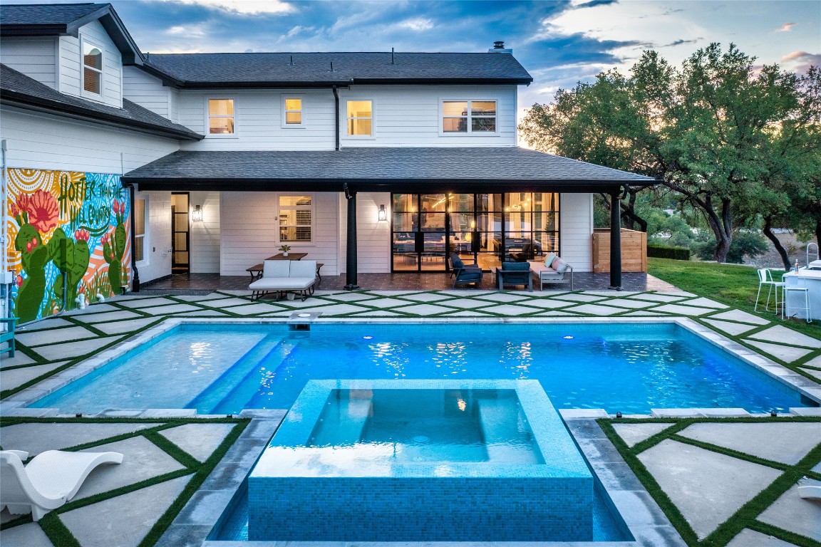 12605 Fitzhugh Road Austin, TX 78736 - Photo 2 of 40 a swimming pool view with a seating space