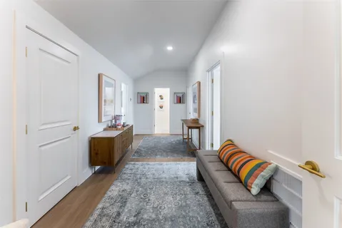 a bedroom with double bunk beds and a window