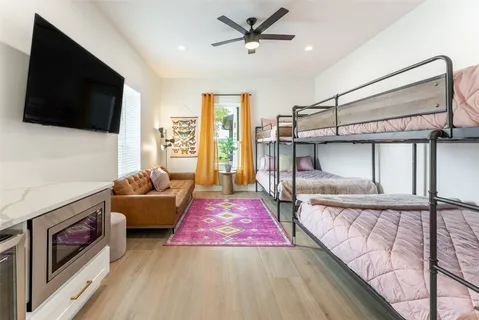 a swimming pool with outdoor seating and yard