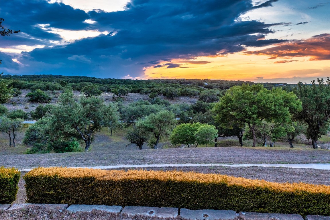 12605 Fitzhugh Road Austin, TX 78736 - Photo 5 of 40 a view of a swimming pool with an outdoor seating