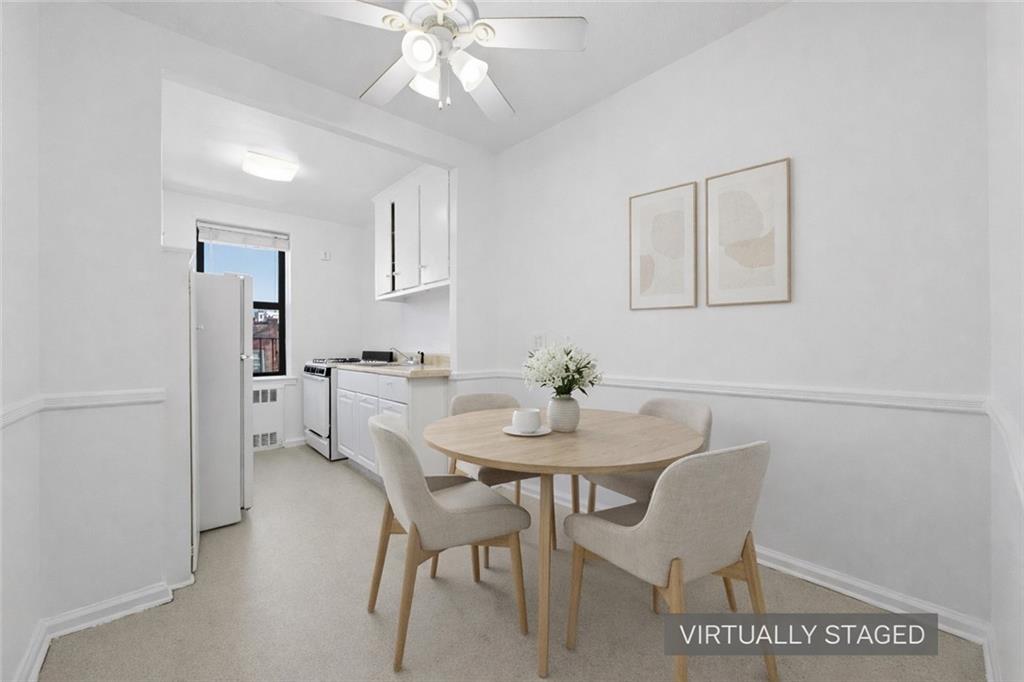 302 96th Street, Unit 3H Brooklyn, NY 11209 - Photo 6 of 14 a view of a dining room with furniture and wooden floor