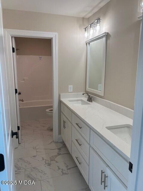 177 Camden Trace Macon, GA 31210 - Photo 17 of 19 a bathroom with a shower sink and mirror