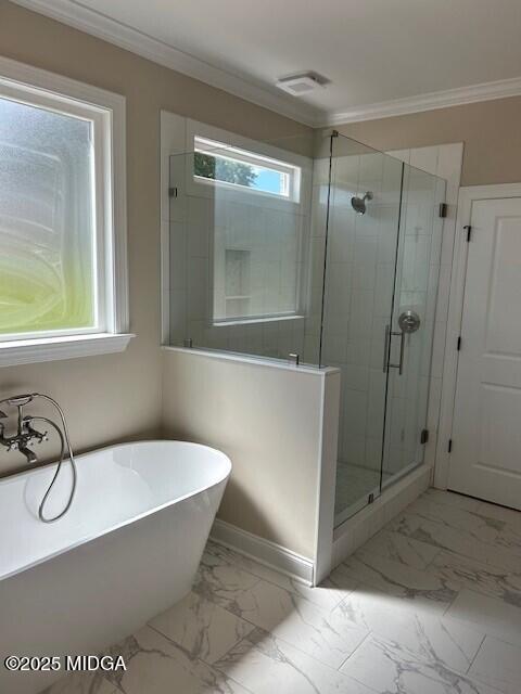 177 Camden Trace Macon, GA 31210 - Photo 10 of 19 a bathroom with a tub a window and a shower