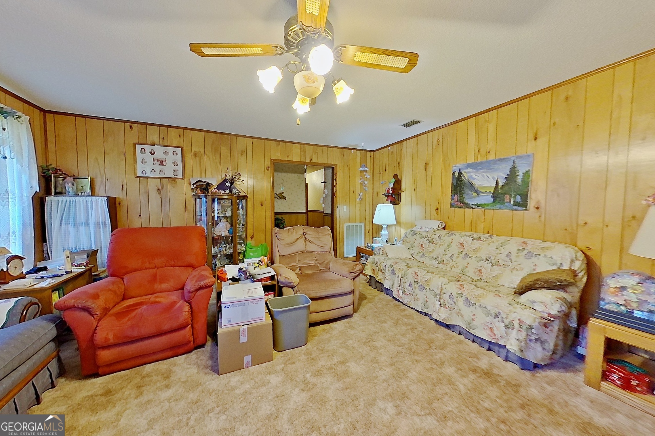2142 Ben Couch Road Blackshear, GA 31516 - Photo 12 of 43 a living room with furniture and a flat screen tv