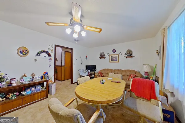 a view of a dining room with furniture