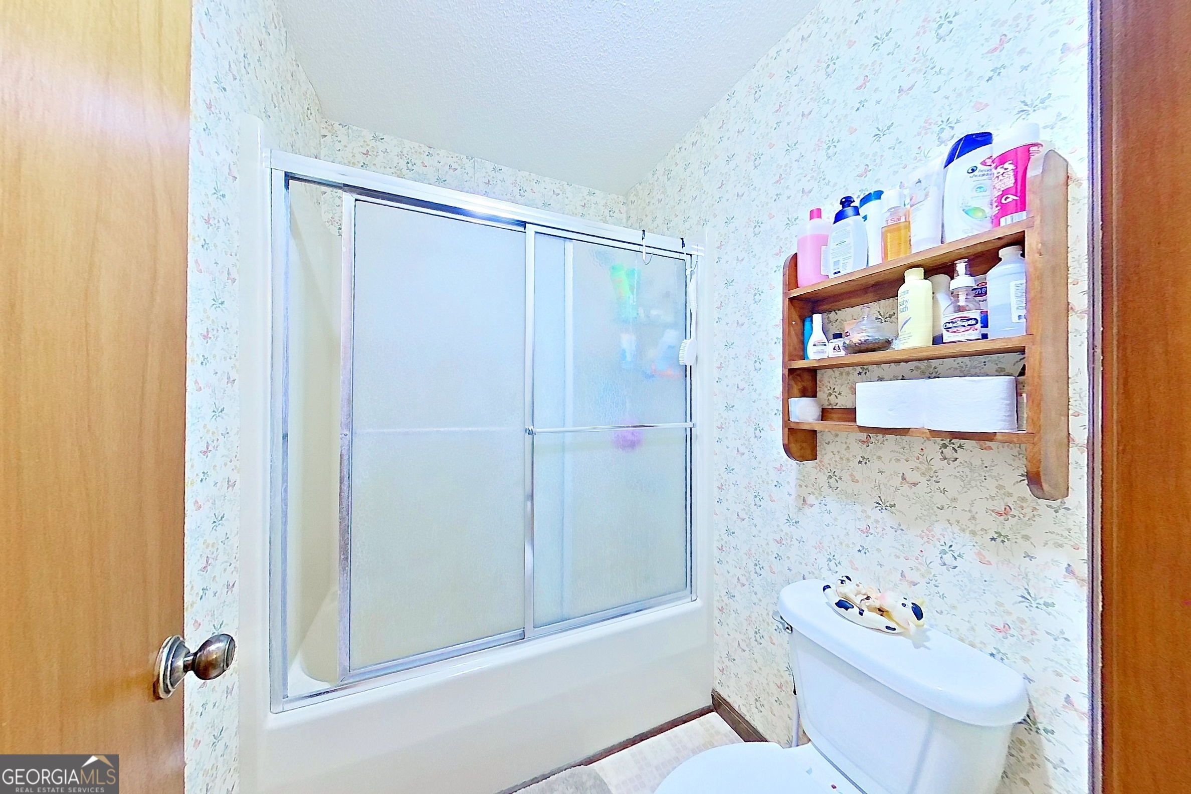 2142 Ben Couch Road Blackshear, GA 31516 - Photo 17 of 43 a bathroom with a sink toilet and shower