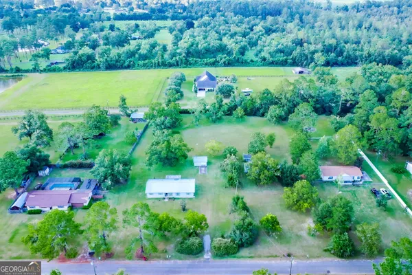 a view of yard with small swimming pool and mountain view
