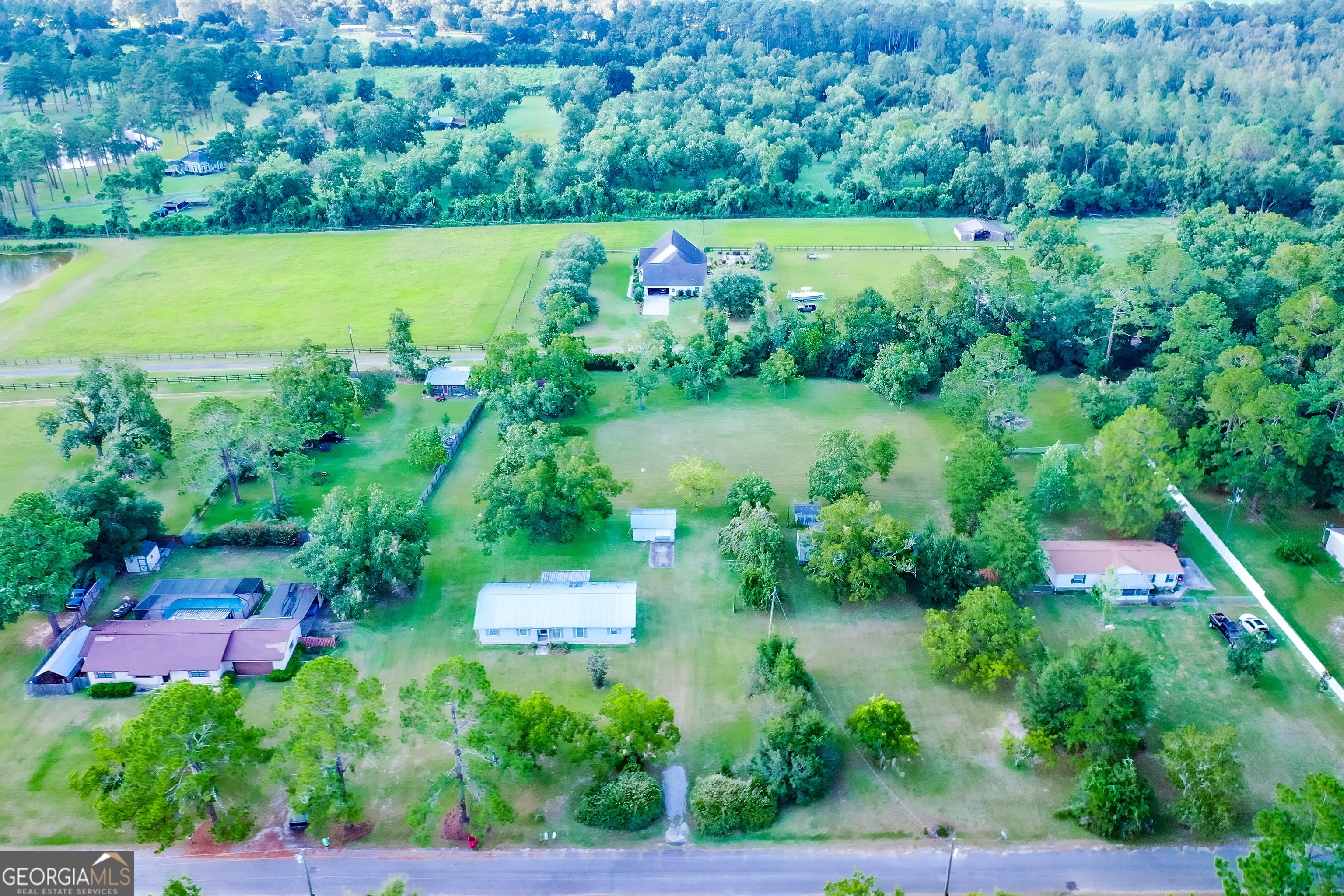 2142 Ben Couch Road Blackshear, GA 31516 - Photo 22 of 43 a view of yard with small swimming pool and mountain view