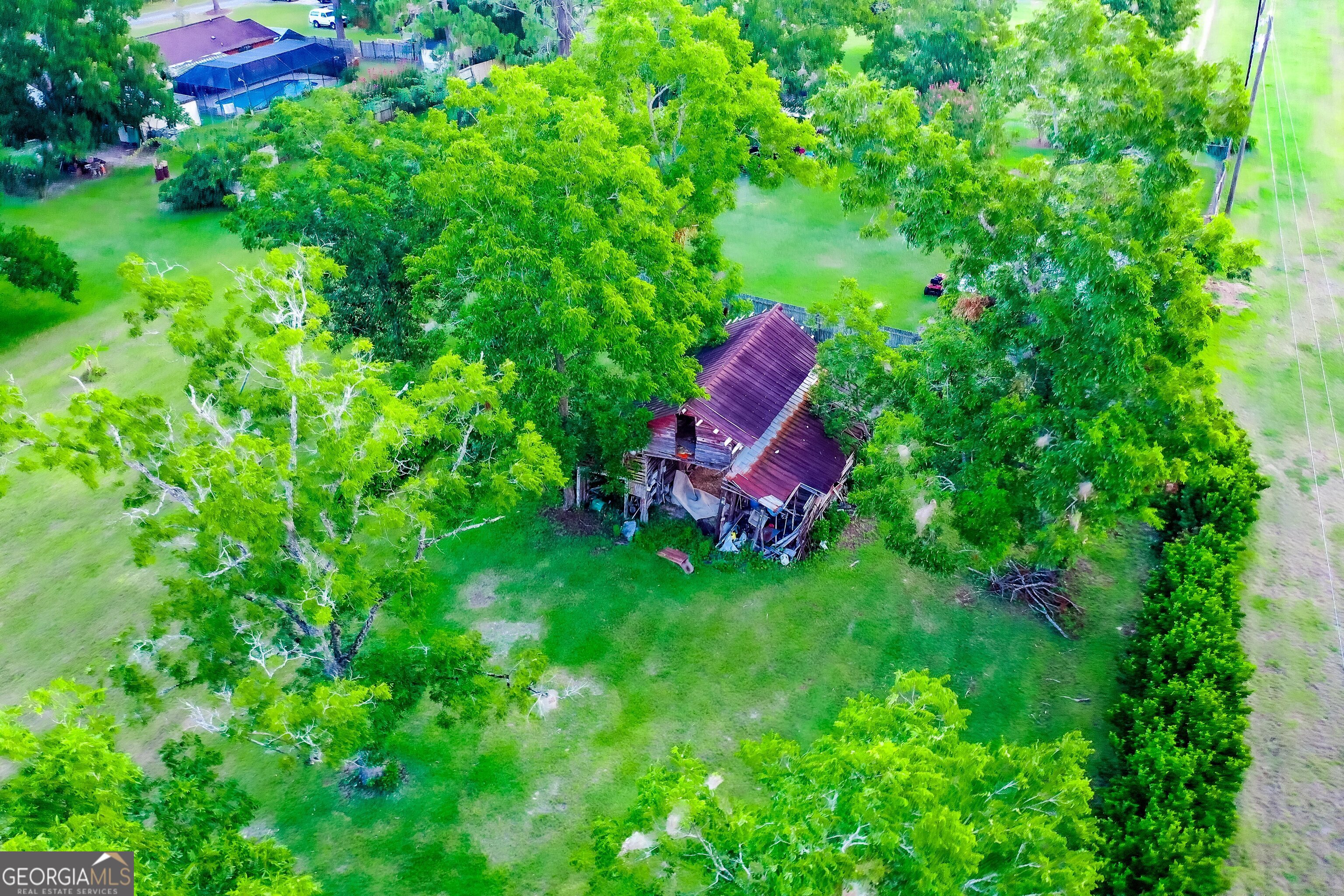 2142 Ben Couch Road Blackshear, GA 31516 - Photo 24 of 43 a view of a backyard with garden