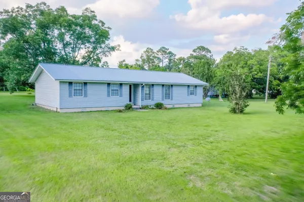 a house view with a garden space