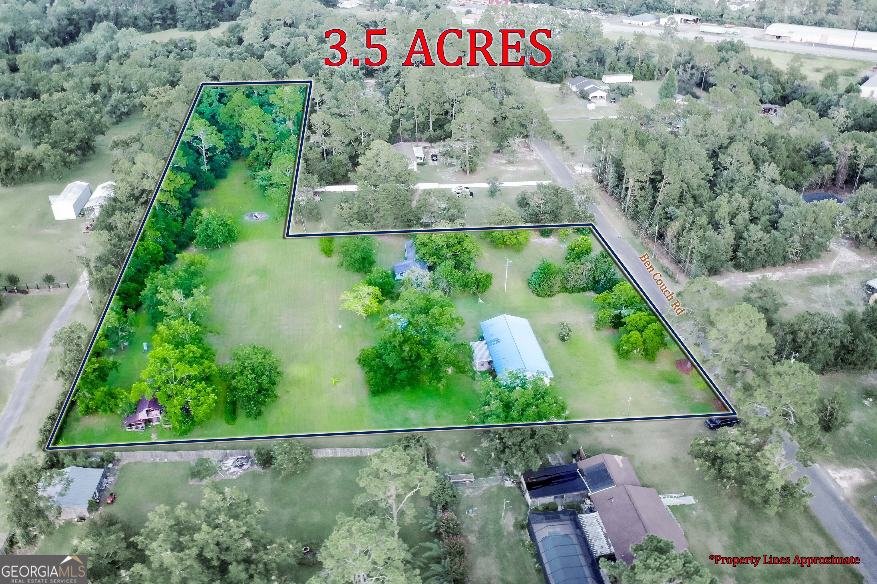 2142 Ben Couch Road Blackshear, GA 31516 - Photo 26 of 43 a view of a sign in a garden