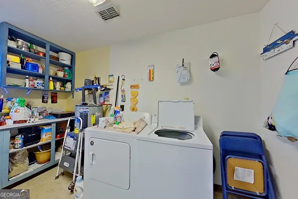 a room with storage and utility