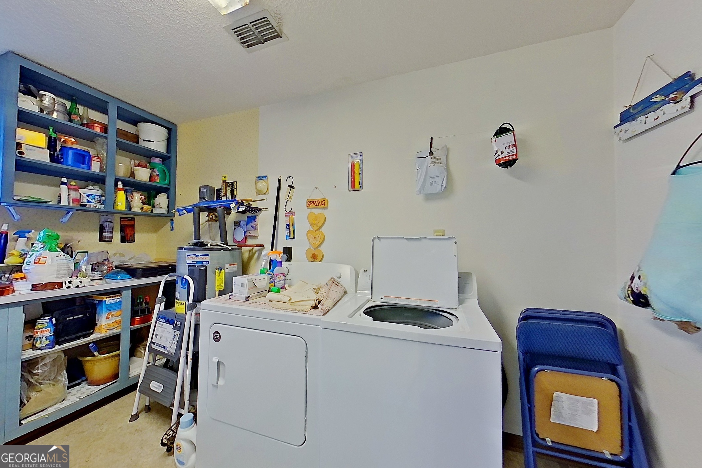 2142 Ben Couch Road Blackshear, GA 31516 - Photo 27 of 43 a room with storage and utility