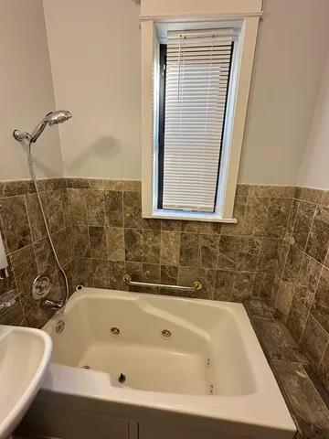 a bathroom with a bathtub