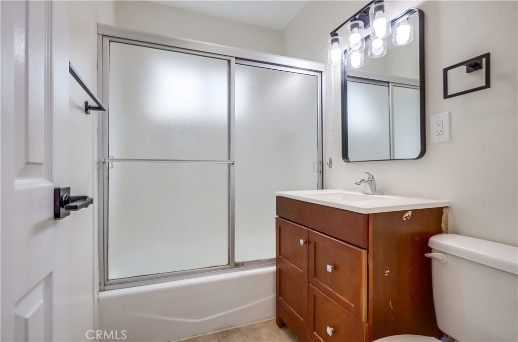 142 Avenida Pelayo, Unit B San Clemente, CA 92672 - Photo 17 of 26 a bathroom with a sink toilet and shower