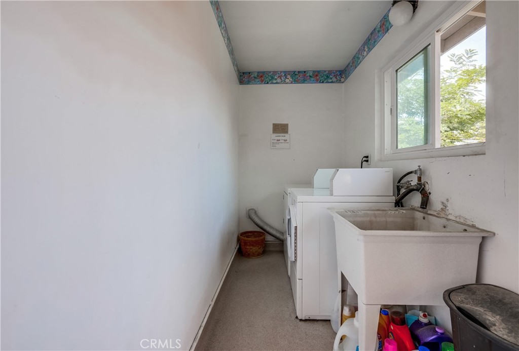 142 Avenida Pelayo, Unit B San Clemente, CA 92672 - Photo 22 of 26 a storage room with a washer and dryer