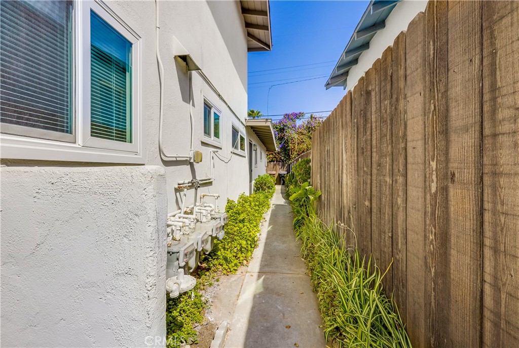 142 Avenida Pelayo, Unit B San Clemente, CA 92672 - Photo 25 of 26 a view of a pathway of a house with potted plants