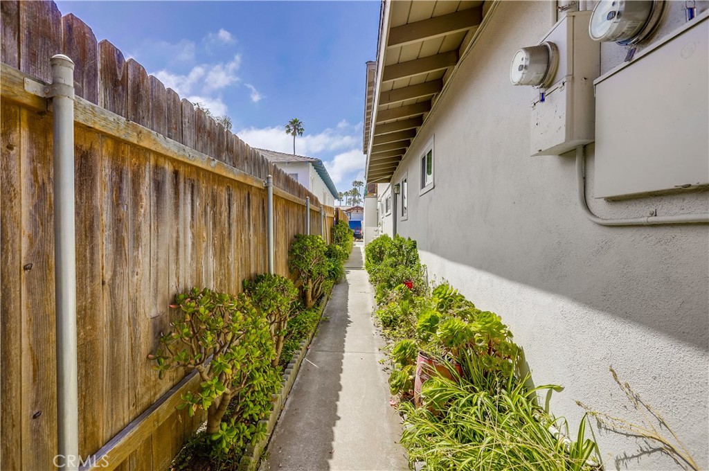 142 Avenida Pelayo, Unit B San Clemente, CA 92672 - Photo 26 of 26 a view of a pathway along the building