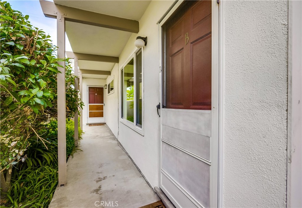 142 Avenida Pelayo, Unit B San Clemente, CA 92672 - Photo 3 of 26 a view of a pathway of the house