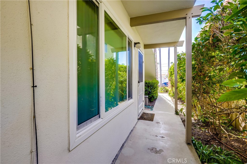 142 Avenida Pelayo, Unit B San Clemente, CA 92672 - Photo 4 of 26 a view of a garden from a windows