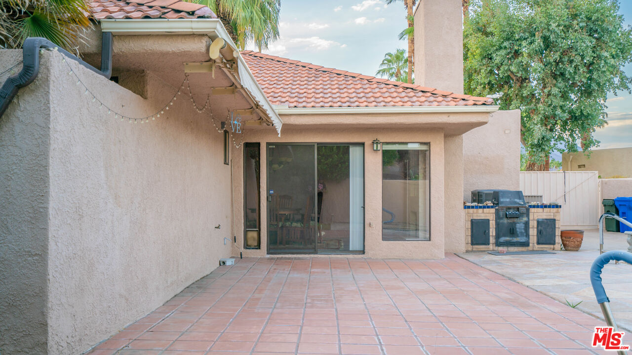 1592 South Compadre Road Palm Springs, CA 92264 - Photo 46 of 53 a view of front door with outdoor seating