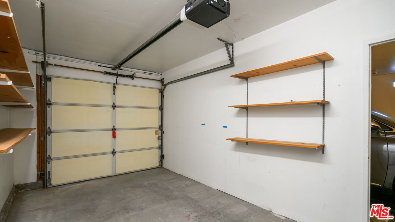 1592 South Compadre Road Palm Springs, CA 92264 - Photo 52 of 53 a view of a room with rack on the wall