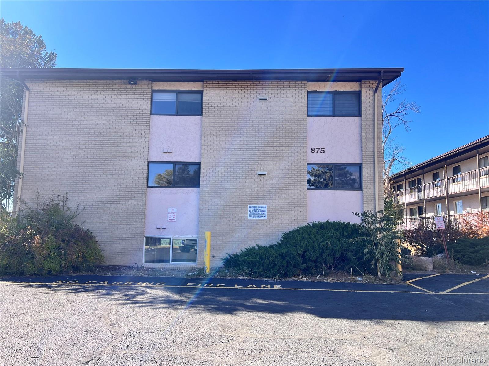 875 South Quebec Street, Unit 29 Denver, CO 80247 - Photo 13 of 13 a house with yard
