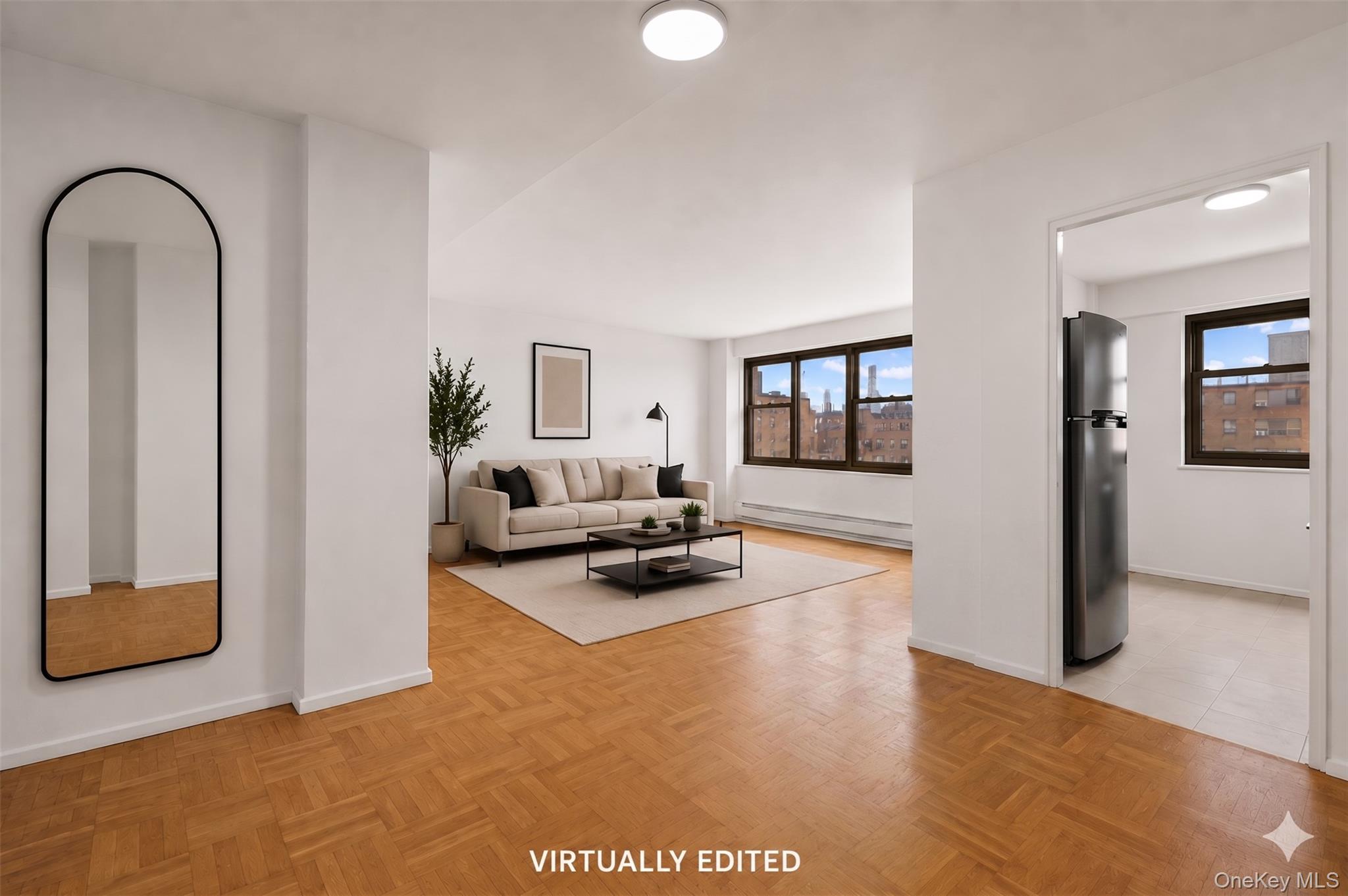 21-66 33rd Road, Unit 12B Queens, NY 11106 - Photo 10 of 23 a view of a livingroom with furniture and a flat screen tv