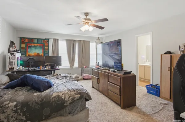 a kitchen with a stove a refrigerator and a sink
