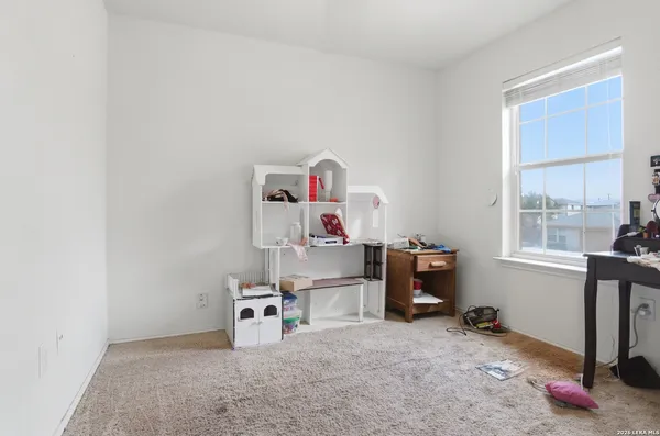 a room with furniture and a window