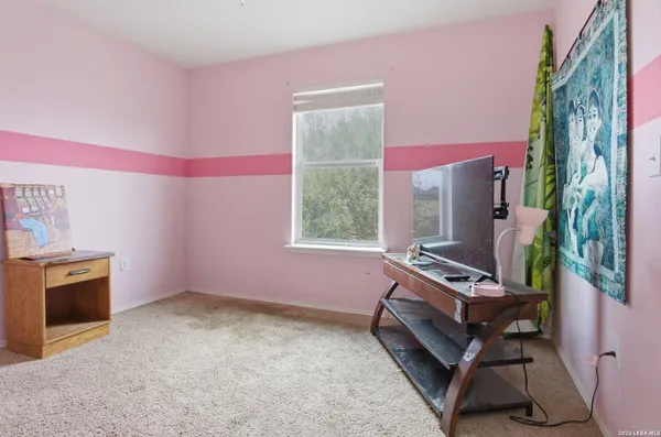 a room with furniture and a fireplace