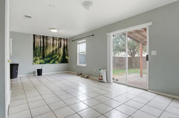 a view of an empty room and window