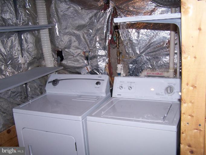 11930 Fieldthorn Court Reston, VA 20194 - Photo 5 of 12 a view of washer and dryer