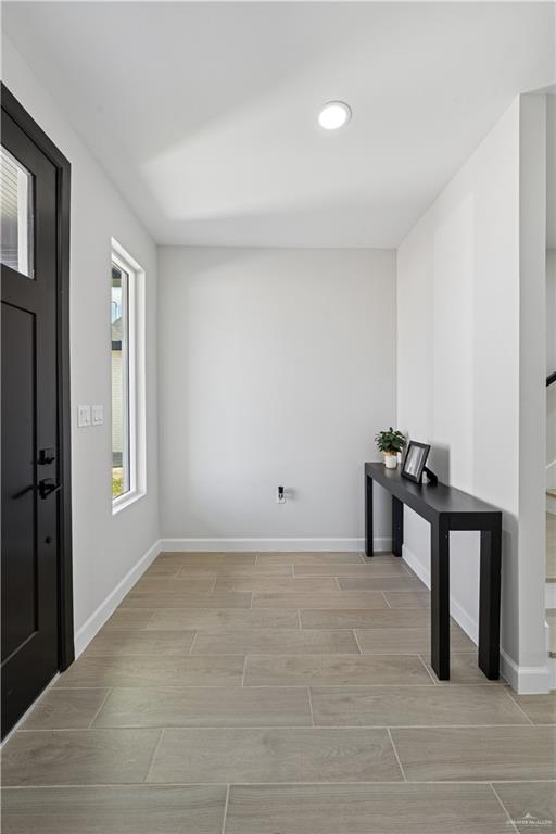 1013 Azalea Street Mission, TX 78573 - Photo 3 of 35 Entryway with wood finish floors and recessed lighting
