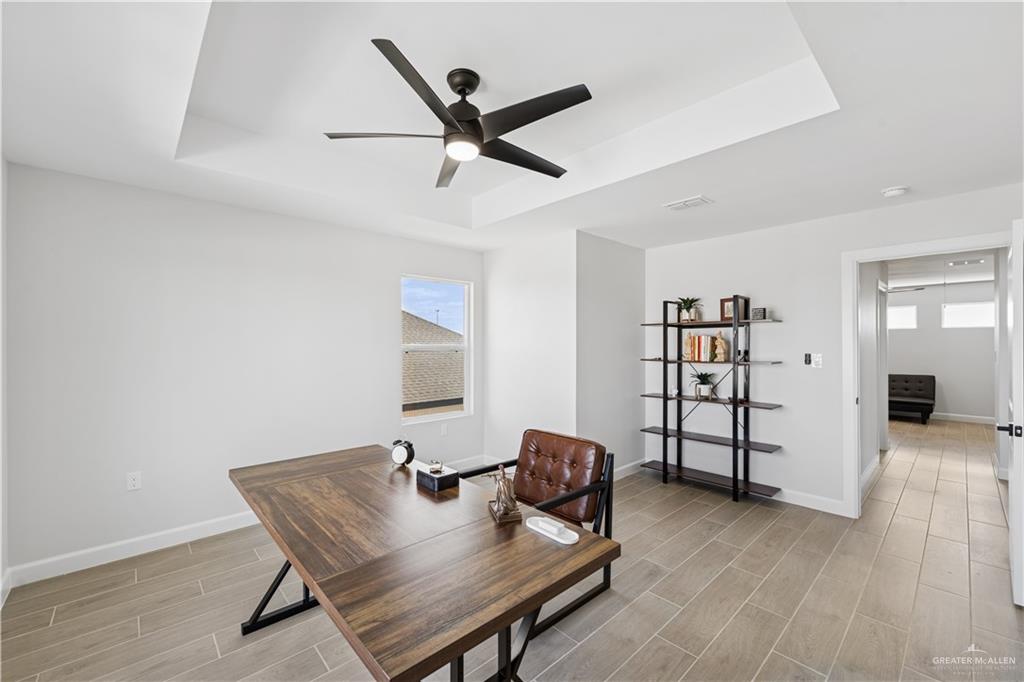1013 Azalea Street Mission, TX 78573 - Photo 33 of 35 Office space featuring a raised ceiling, wood tiled floors, and a ceiling fan
