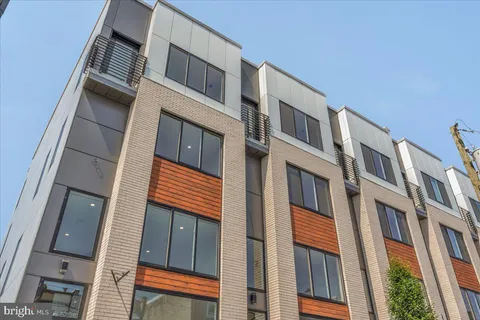 a view of a building with a window and door