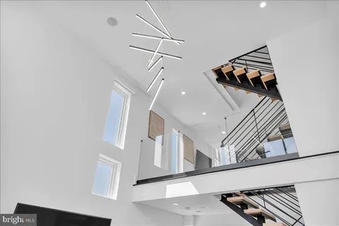 a view of a hallway with staircase