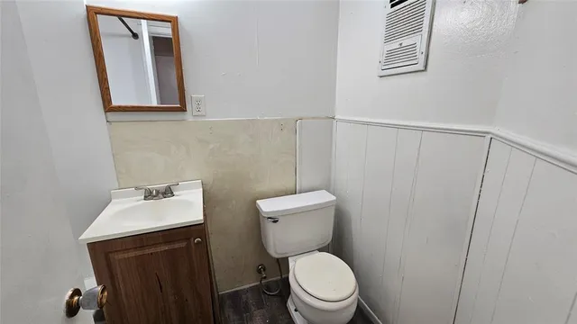 a bathroom with a sink and mirror