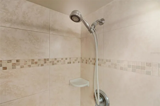 a view of a lake with houses in the back