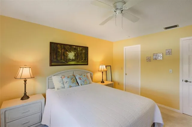 an aerial view of a house with a lake view