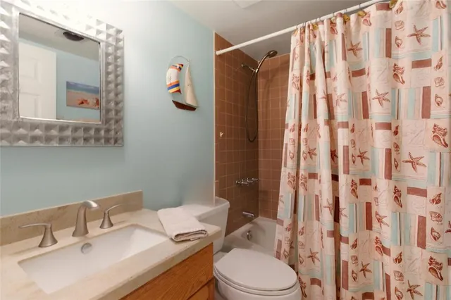 a view of a patio with swimming pool table and chairs