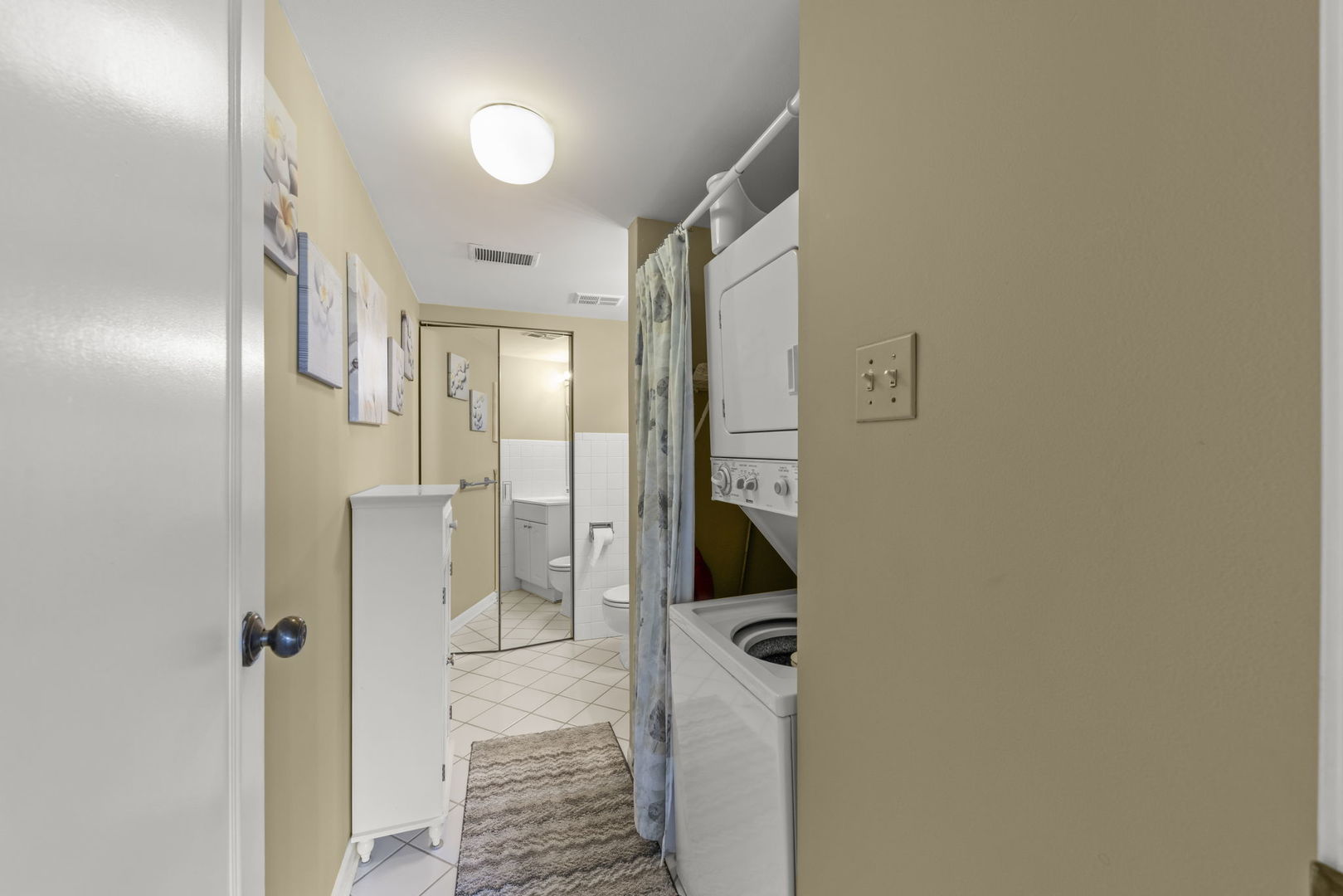 500 Redondo Drive, Unit 409 Downers Grove, IL 60516 - Photo 13 of 18 a bathroom with a sink and glass door shower